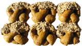 Hand-dipped organic dog pretzels with carob and crushed nuts, gourmet treats for large dogs handmade by Bone Bons.